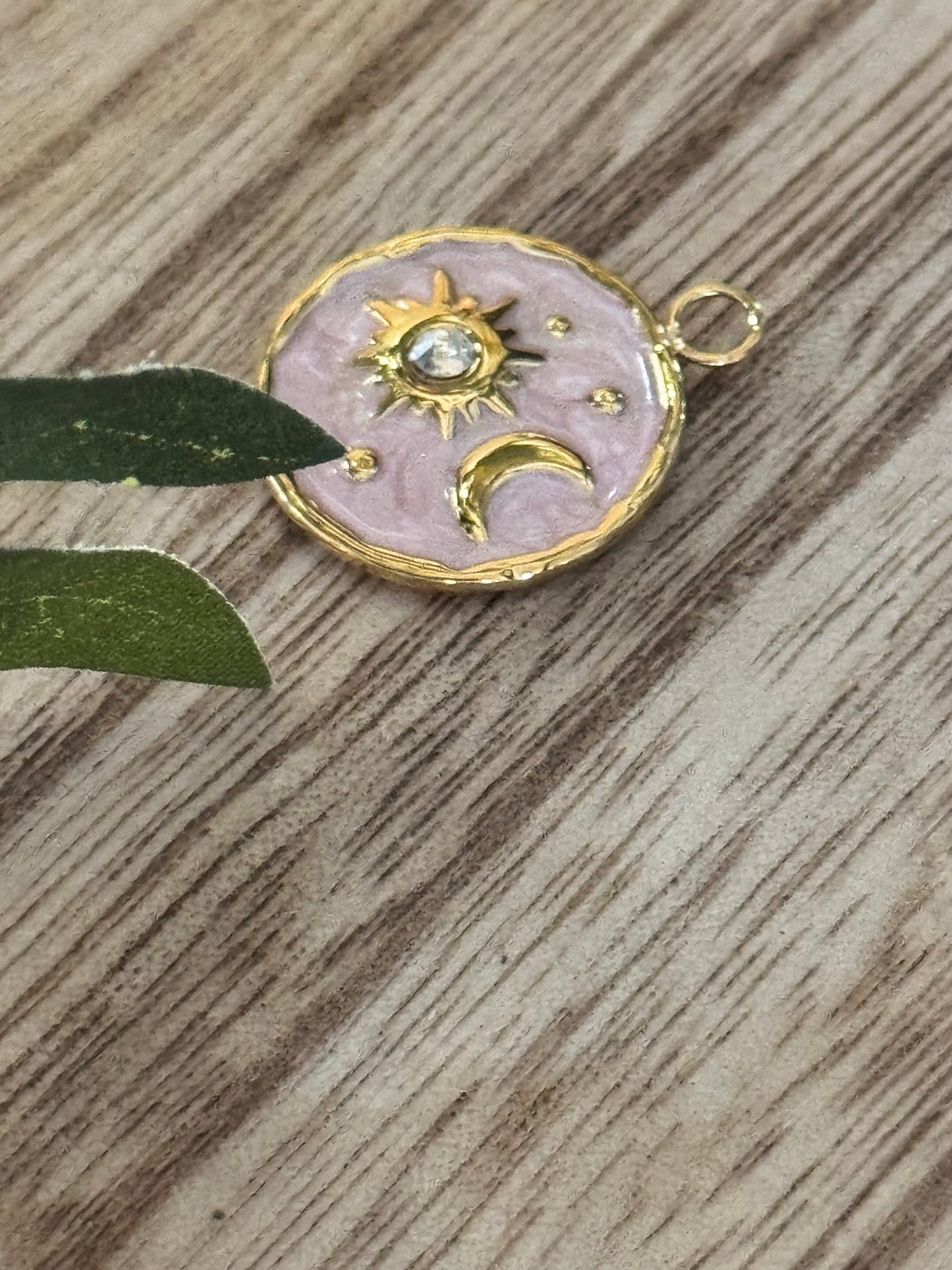 Sun and moon pendant